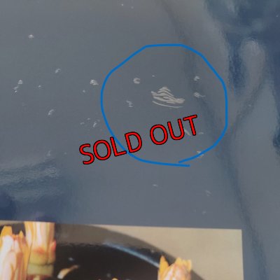 ブックカバーのPP加工に少し浮いた部分があります。